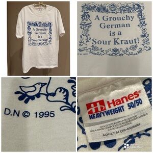 Vintage 95 humorous German-themed phrase "A Grouchy German is a Sour Kraut!" Tee